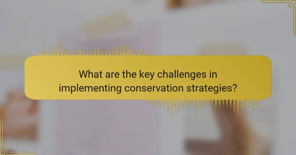 What are the key challenges in implementing conservation strategies?
